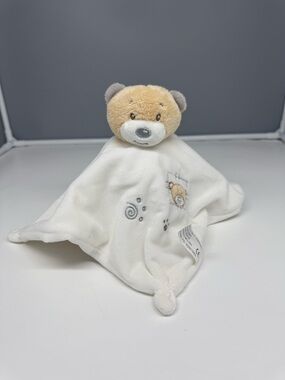 Tiny Treasures Plush baby lovey comforter featuring a beige teddy bear.